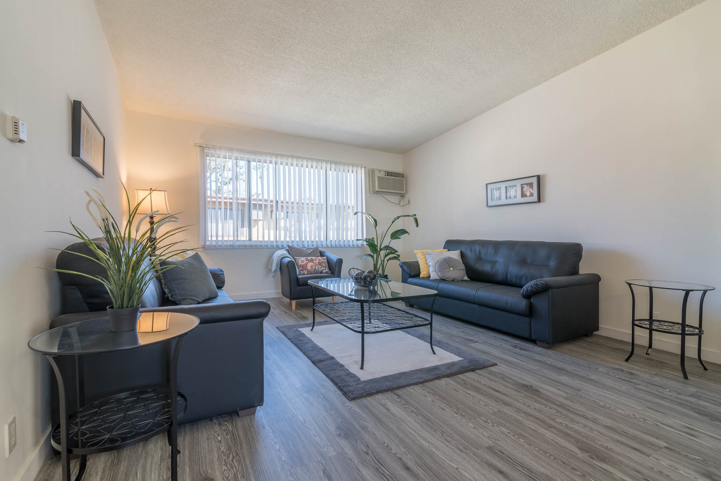 a living room with a couch and a table